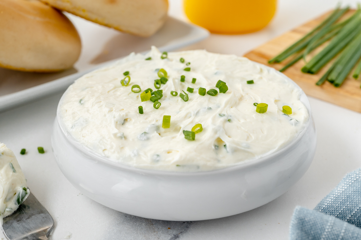 angled shot of bowl of savory cream cheese