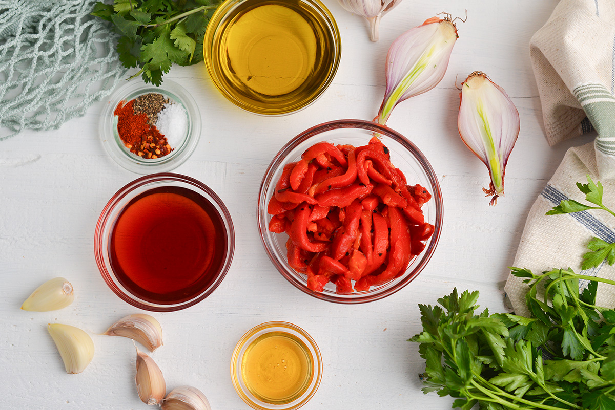 overhead shot of red chimichurri sauce ingredients