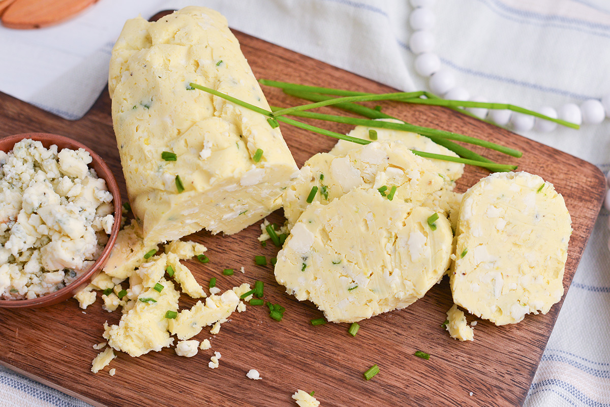 angled shot of sliced blue cheese butter