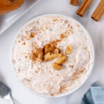 honey walnut cream cheese in bowl with chopped walnuts on top