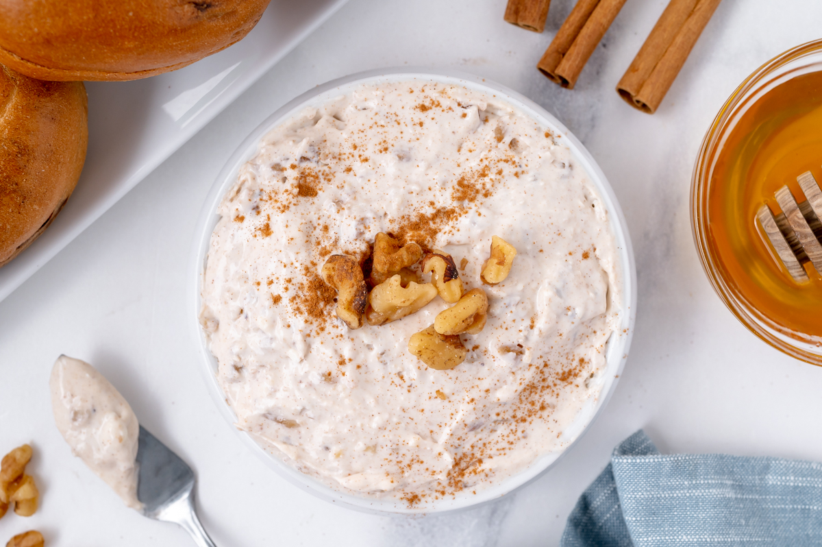 honey walnut cream cheese in bowl with chopped walnuts on top