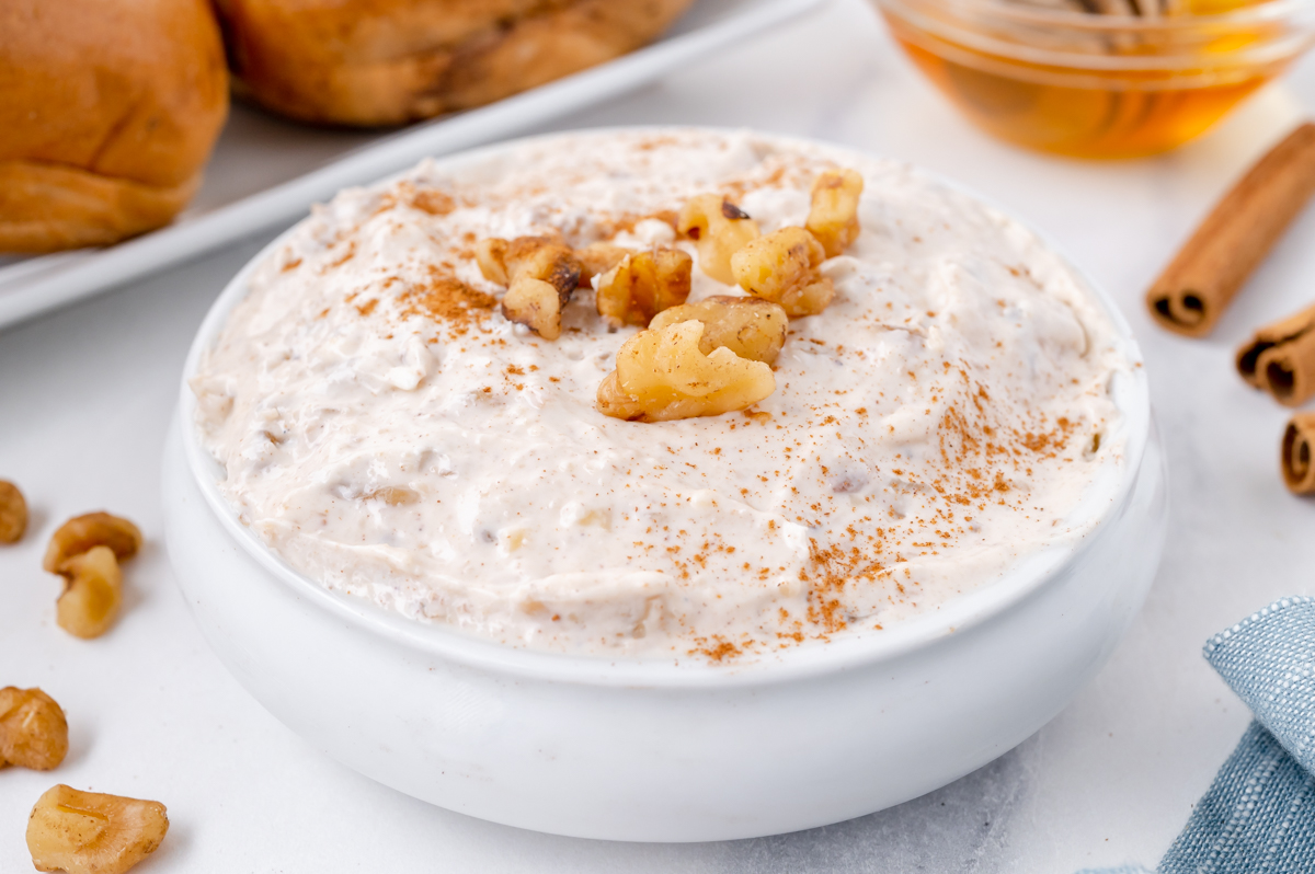 whipped honey walnut cream cheese in white bowl