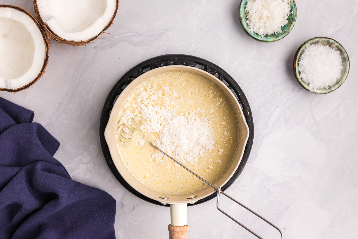 sweet coconut sauce cooking in pan